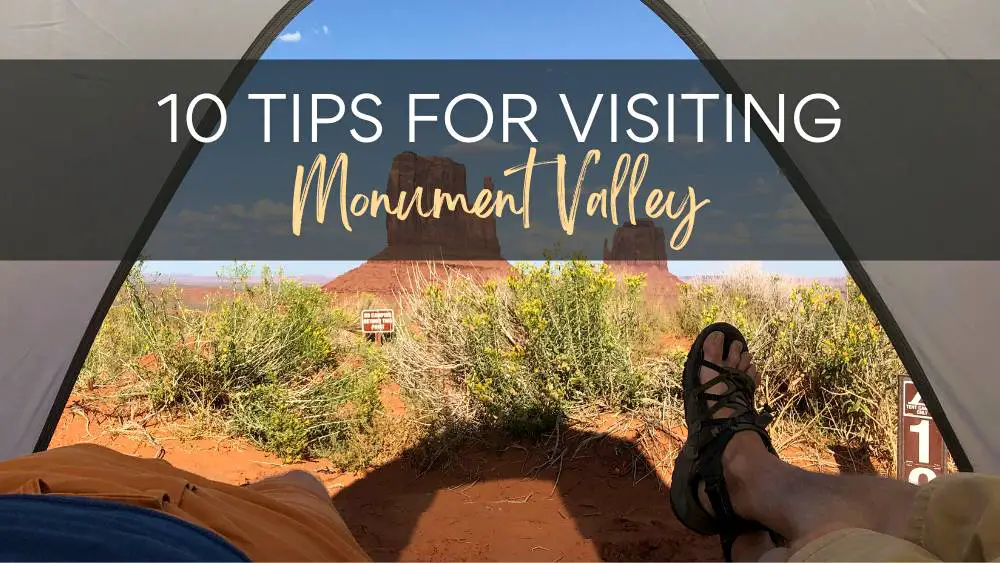 View of James and Kevin inside the tent with huge rock formations in the background, and the text is "10 Tips for Visiting Monument Valley Header."