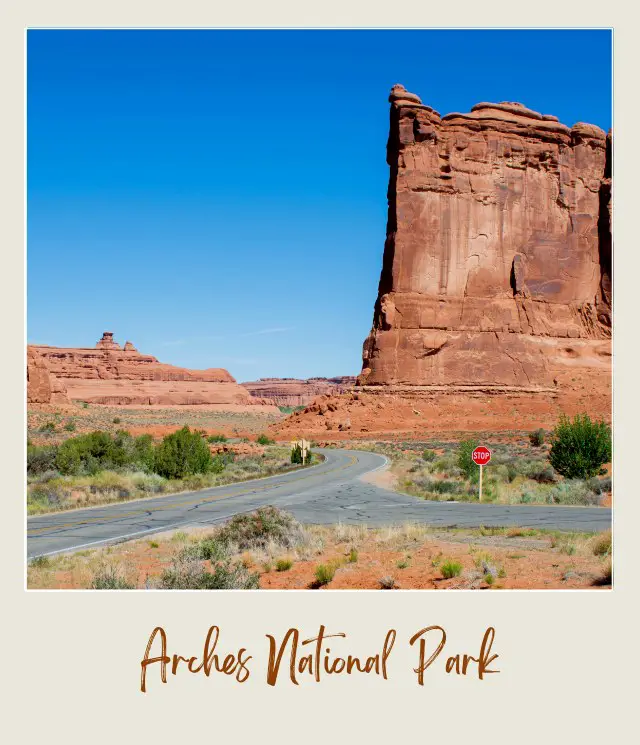 Straight round, surrounded by huge rock formations, and bushes under the blue sky.