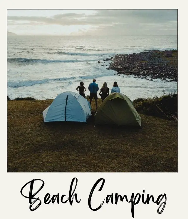 20 Beach Camping Tips for First Timers 2 tents on edge of beach with 4 people looking at ocean