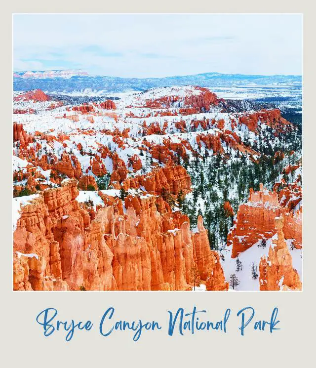 Red huge rock formations covered with snow in Bryce Canyon National Park