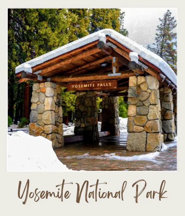 How to Get to Yosemite National Park stone bus shelter with snow on it one of the stops on the yosemite national park shuttle