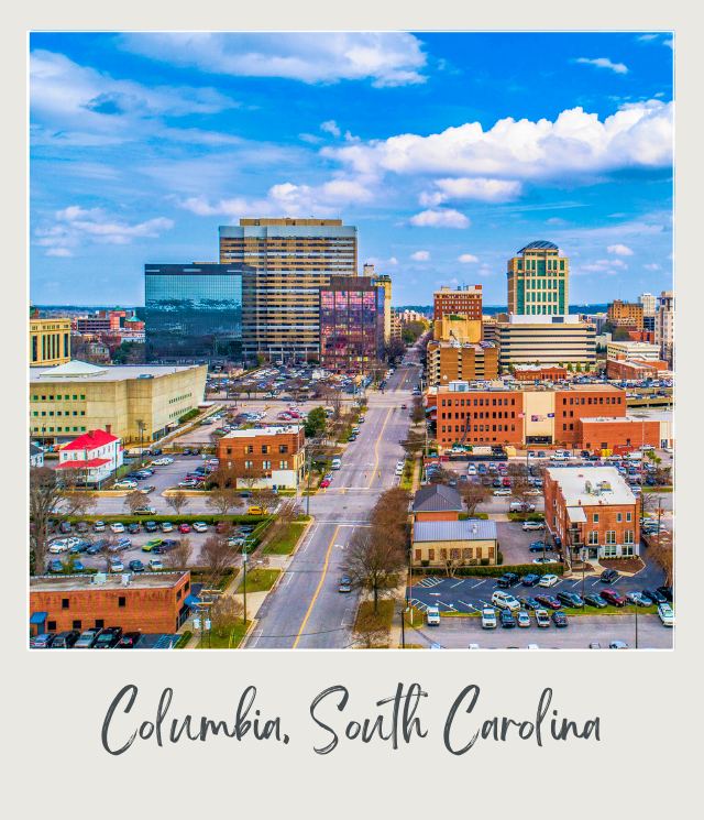 Roads in the middle of the city surrounded by buildings and trees in the middle of the day in Columbia, South Carolina