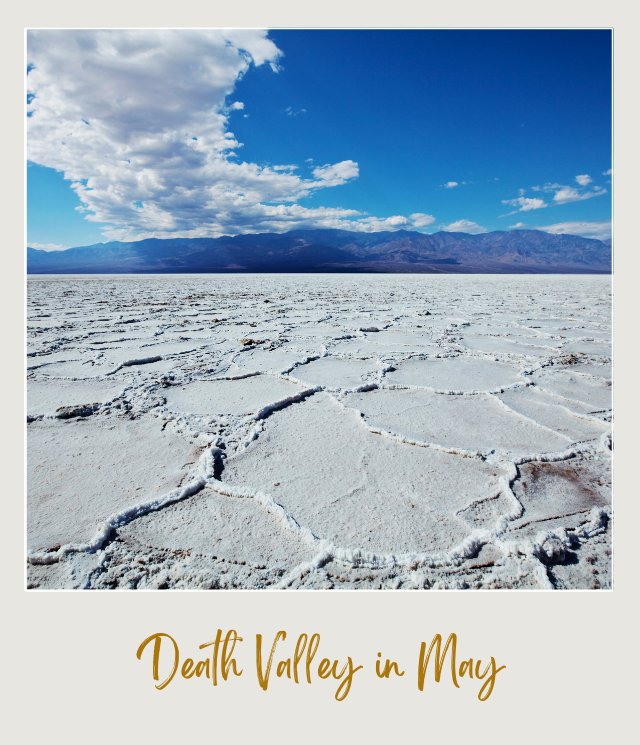 View of white salt flats and mountains in the background in Death Valley National Park