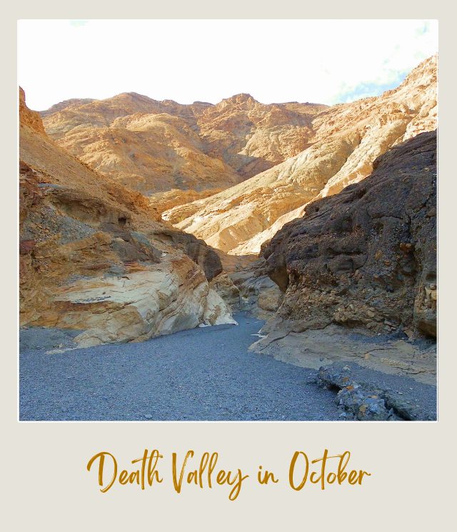 View of a trail surrounded by mountains in Death Valley National Park.