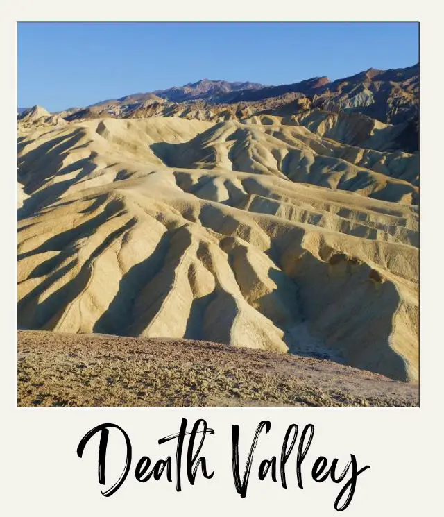 The Best US National Parks yellowish creviced hard sand in Death Valley