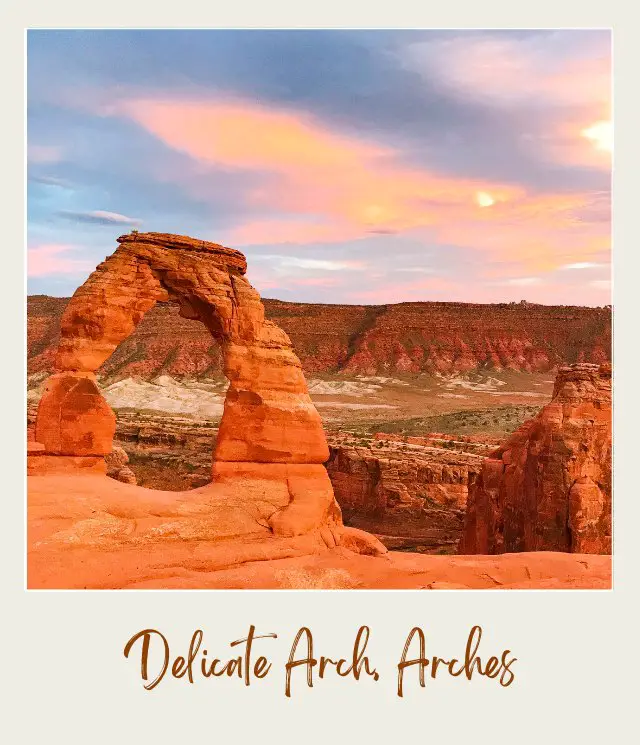 View of the rock-forming arch in Arches National Park during sunrise.