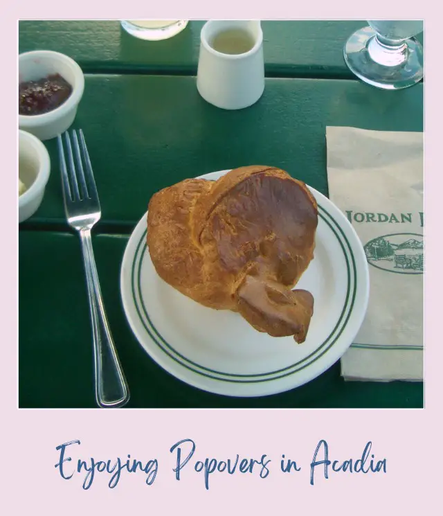 Brown popover in a plate, and besides are white bowls of cream in Acadia National Park.