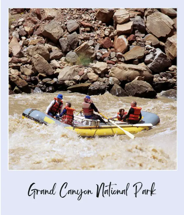 View of people rafting on river in Grand Canyon National Park