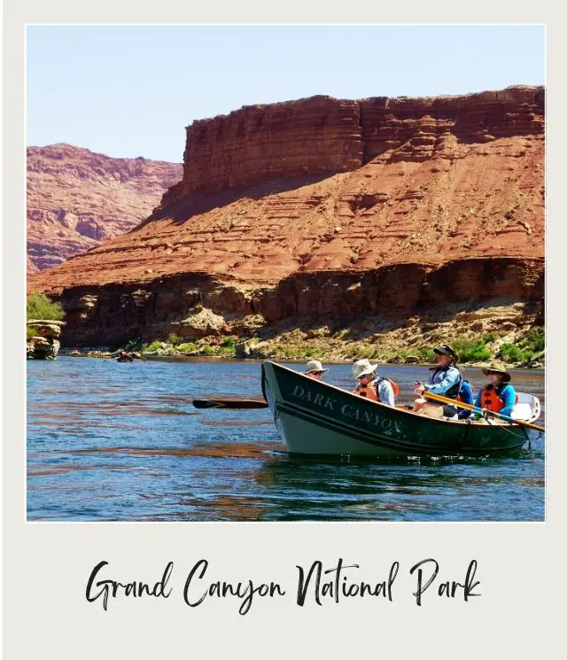 wooden boat on river in grand canyon on river rafting trip through grand canyon