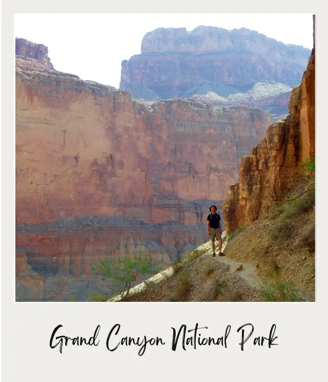 man hiking on narrow path on side of cliff with canyon walls behind him on river trip through grand canyon