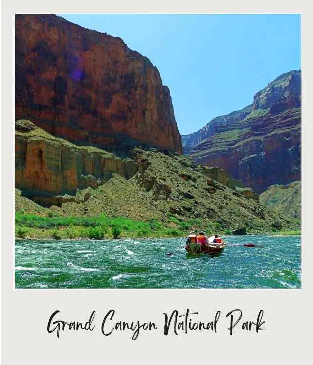 small wooden boat going through rapids in grand canyon on river rafting trip through grand canyon