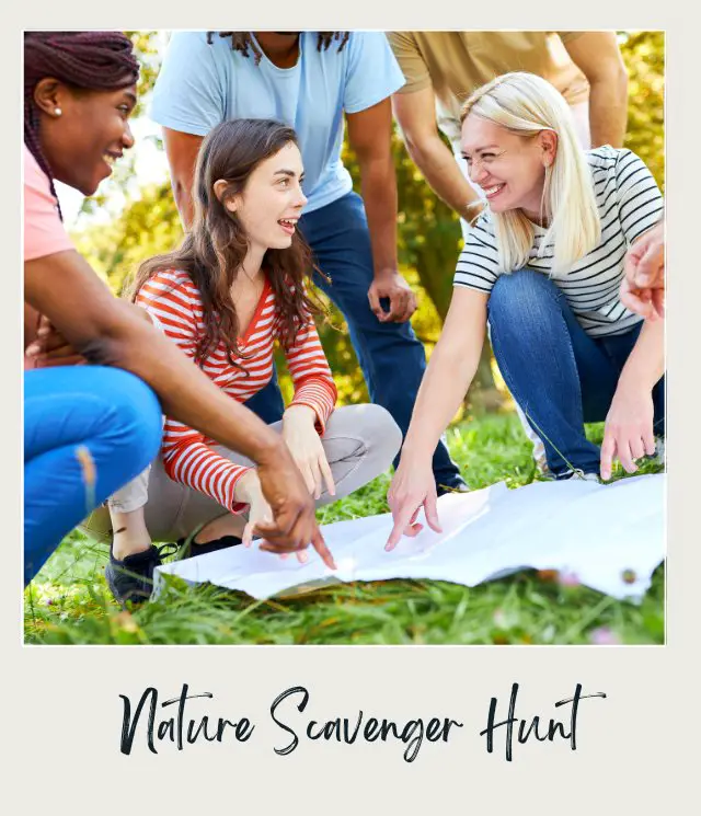 Group of Young People Geocaching as a Scavenger Hunt