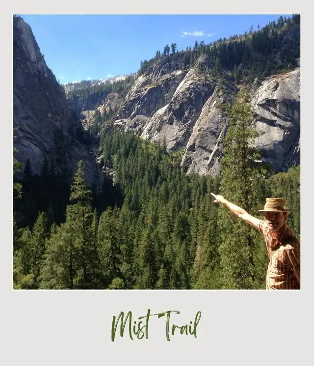 a man pointing at a mountain indicating the Mist Trail in Yosemite National Park