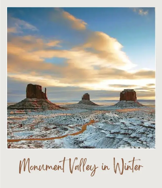 Visiting Monument Valley: What To Expect Throughout the Year View of three huge rock formations and a road covered with snow in Monument Valley.