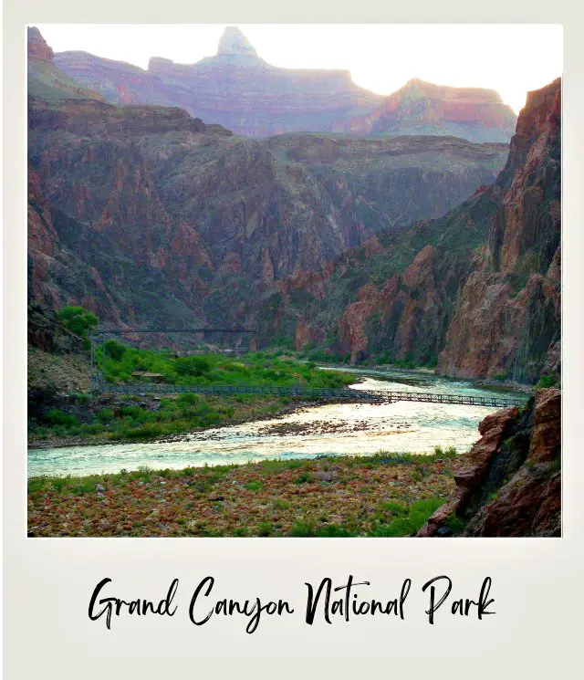 A long and straight bridge crossing above the river surrounded by mountains in Phantom Ranch Grand Canyon National Park.