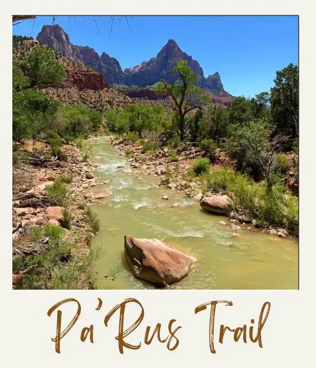 The 5 Best Easy Hikes in Zion National Park narrow river or creek with a large rock in the middle and small trees on both sides and rocky cliffs in background seen form a bridge on the PaRus Trail in Zion National park