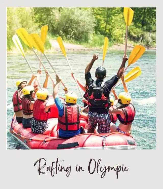 21 Best Things to Do in Olympic National Park People in a kayak holding yellow paddles in the water in Olympic National Park.