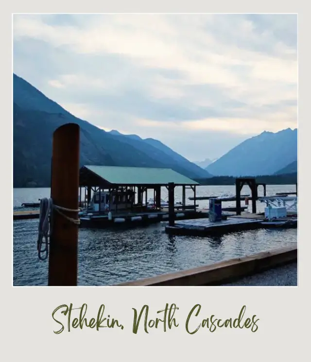 How To Get to North Cascades National Park: Complete Guide boat dock on lake surrounded by mountains at Stehelin in North Cascades National Park