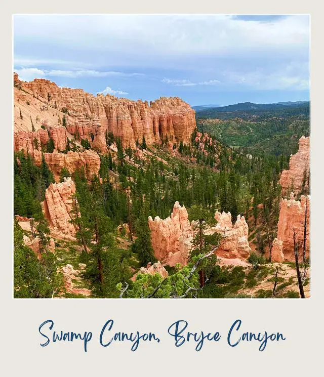 Aerial view of rock mountains and trees under the blue sky in Swamp Canyon Bryce Canyon.