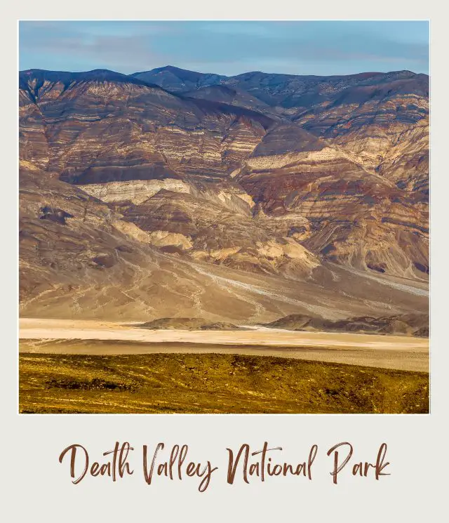 Mountain ranges and below is a plain desert in Death Valley National Park.