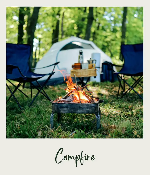 Tent Chairs and Burning Campfire Outdoors