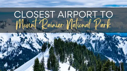 View of mountains covered with snow surrounded by trees, with the text, Closest Airport To Mount Rainier National Park.