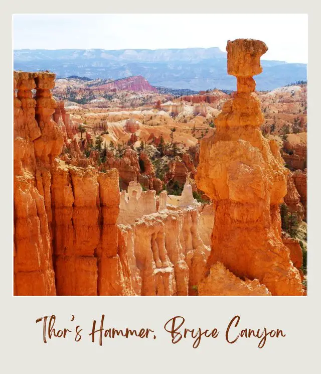 Rock mountains and hoodoos surrounded by trees in Bryce Canyon National Park.