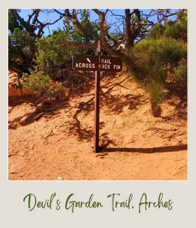 A wooden signage in Devils Garden Trail in Arches National Park.