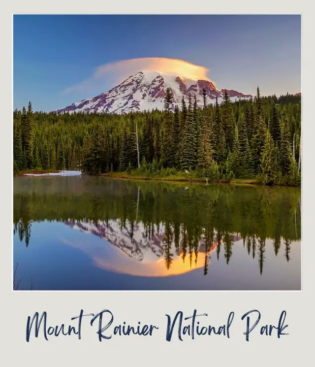 View of mountains trees and lake during sunrise in Mount Rainier National Park