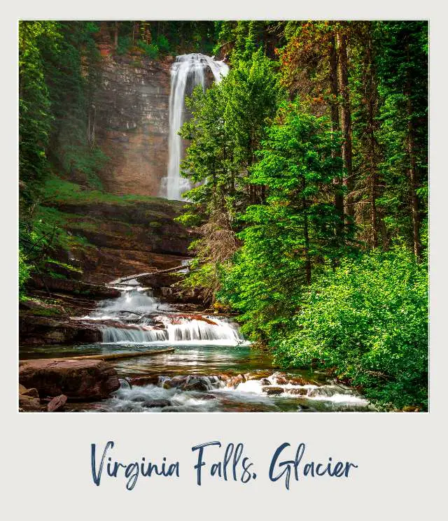 View of falls surrounded by trees and stones in Virginia Falls, Glacier National Park.