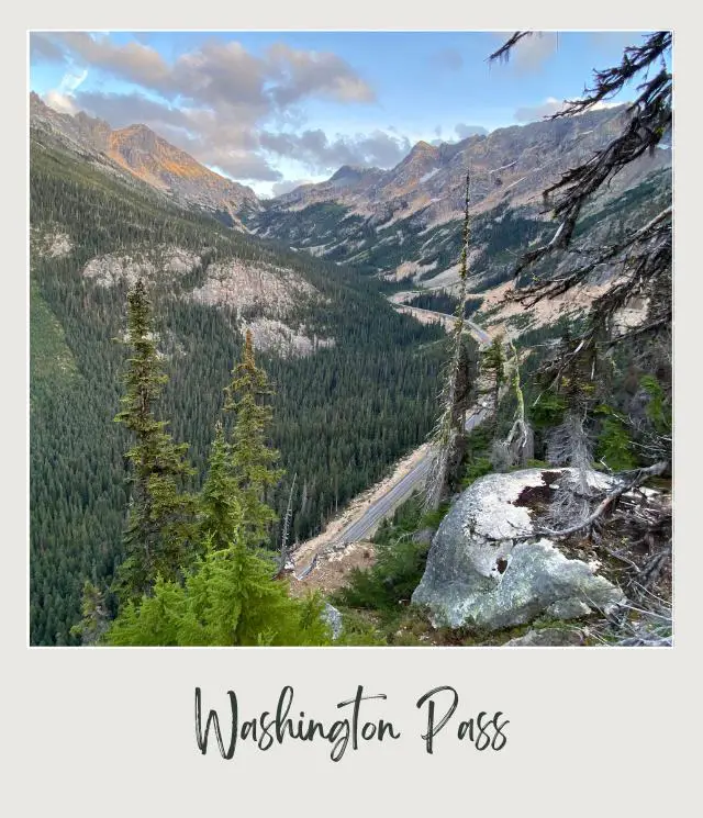 10 Fun Facts About North Cascades National Park Aerial view of concrete road along the mountains surrounded by trees in North Cascades National Park.