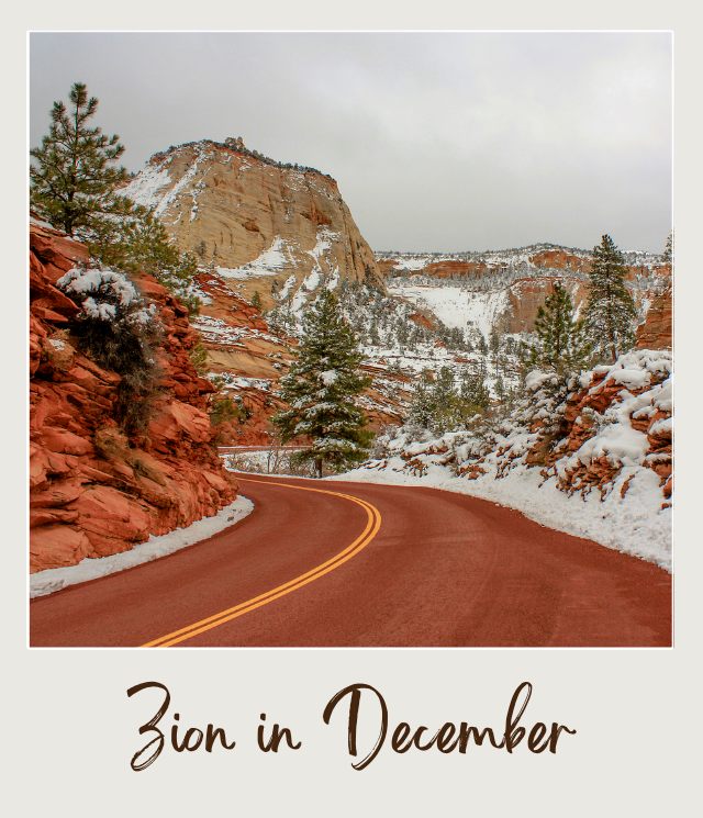 Snow-covered red rock canyon and winding road in Zion National Park in December.