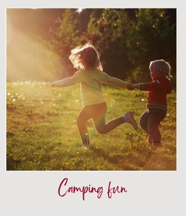 two children running in a field