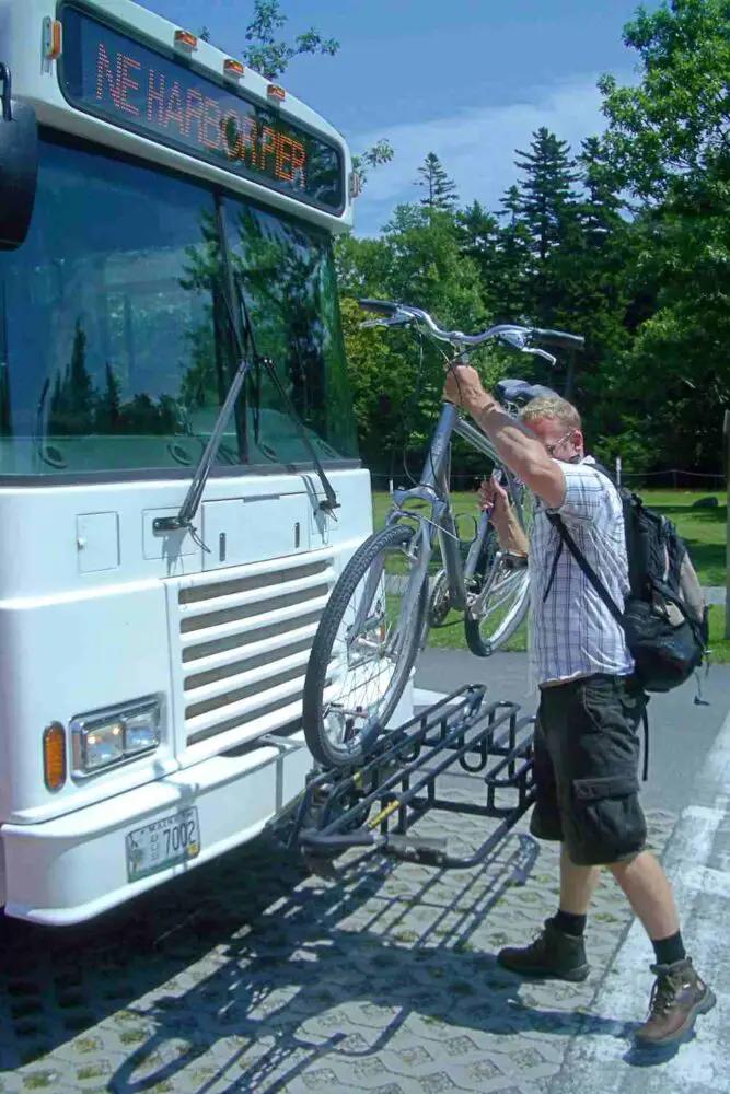 james Putting biycle on front of Island Explorer shuttle in Acadia National Park