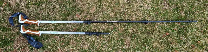 How to Choose Hiking Poles: A Complete Guide for Every Trail Type 2 hiking poles - one long and one short, side by seide to demonstrate telescoping hiking poles