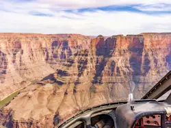 The 10 Best Day Trips from Las Vegas For Nature Lovers canyon with river seen from helicopter
